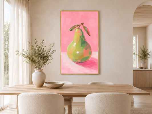 Framed impasto green pear print on warm beige wall above round dining table with white chairs in minimal dining room