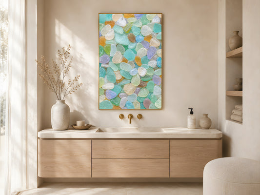 Rainbow sea glass print in gold frame above oak bathroom vanity in bright neutral coastal bathroom