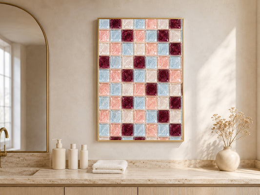 Powder blue tile print framed above a bathroom vanity counter with candles