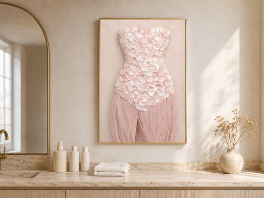 Rose quartz mother of pearl wall art framed in gold, displayed on a bathroom vanity counter.
