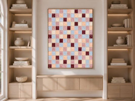Peach blue mosaic wall art framed on a built-in bookshelf with books and decor