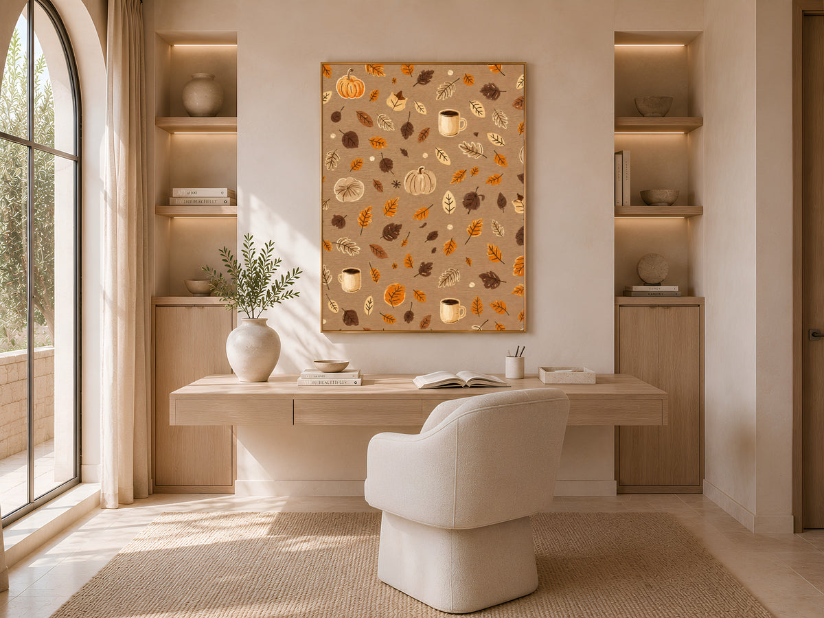 Cozy autumn pattern wall art with pumpkins and leaves above a boucle home office desk