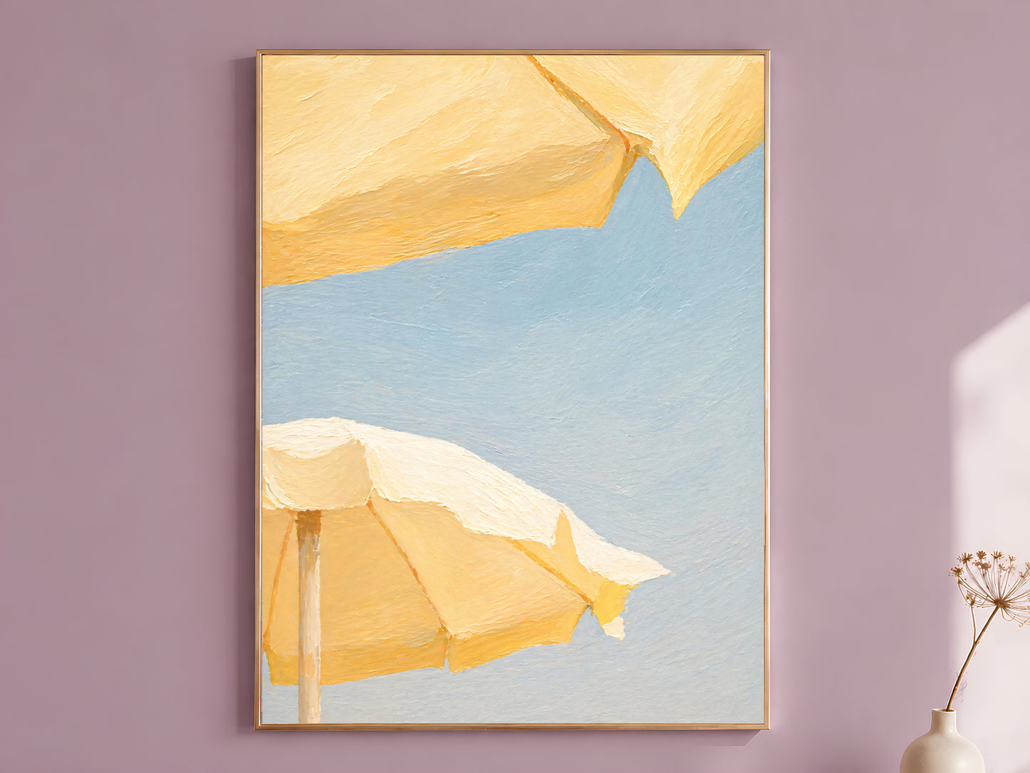 Butter yellow beach umbrella wall art print in a thin gold frame on a dusty lilac wall

