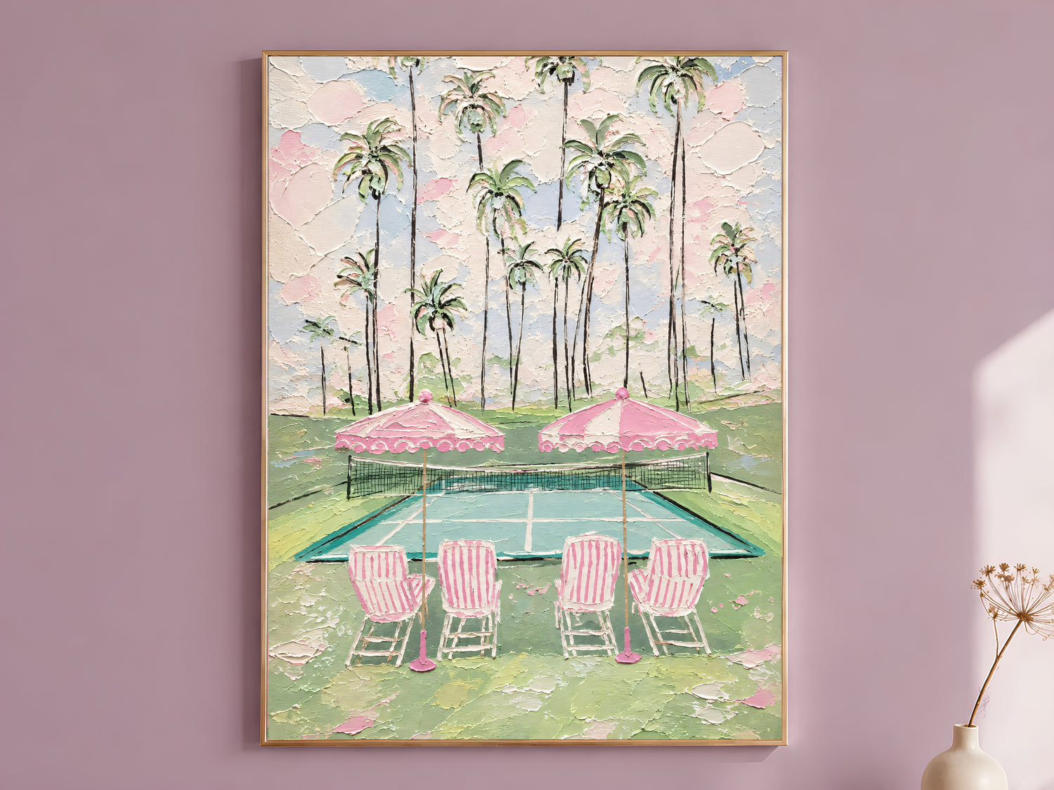 Pink tennis court impasto wall art in gold frame on mauve wall with dried flower stems beside it
