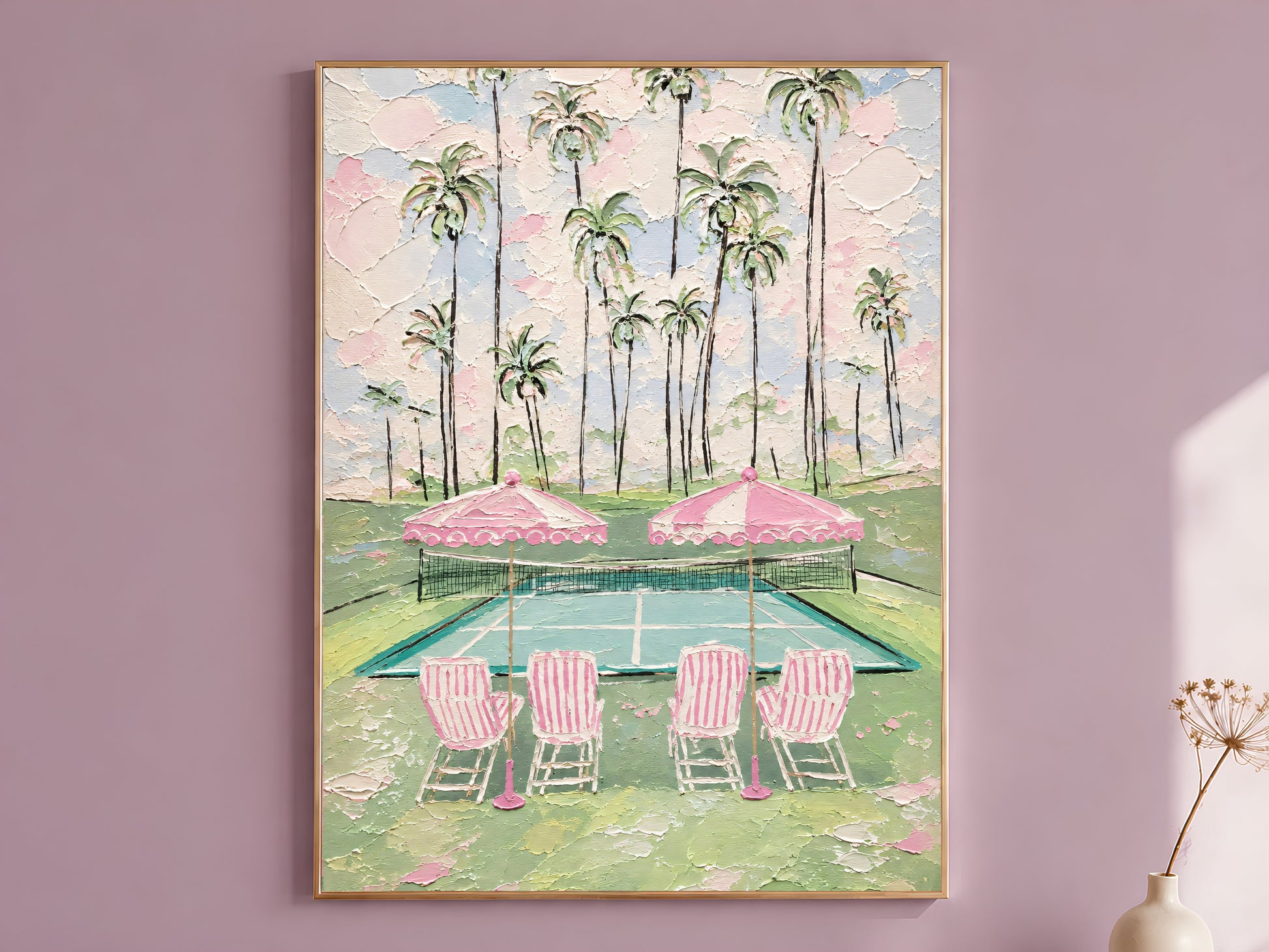 Pink tennis court impasto wall art in gold frame on mauve wall with dried flower stems beside it
