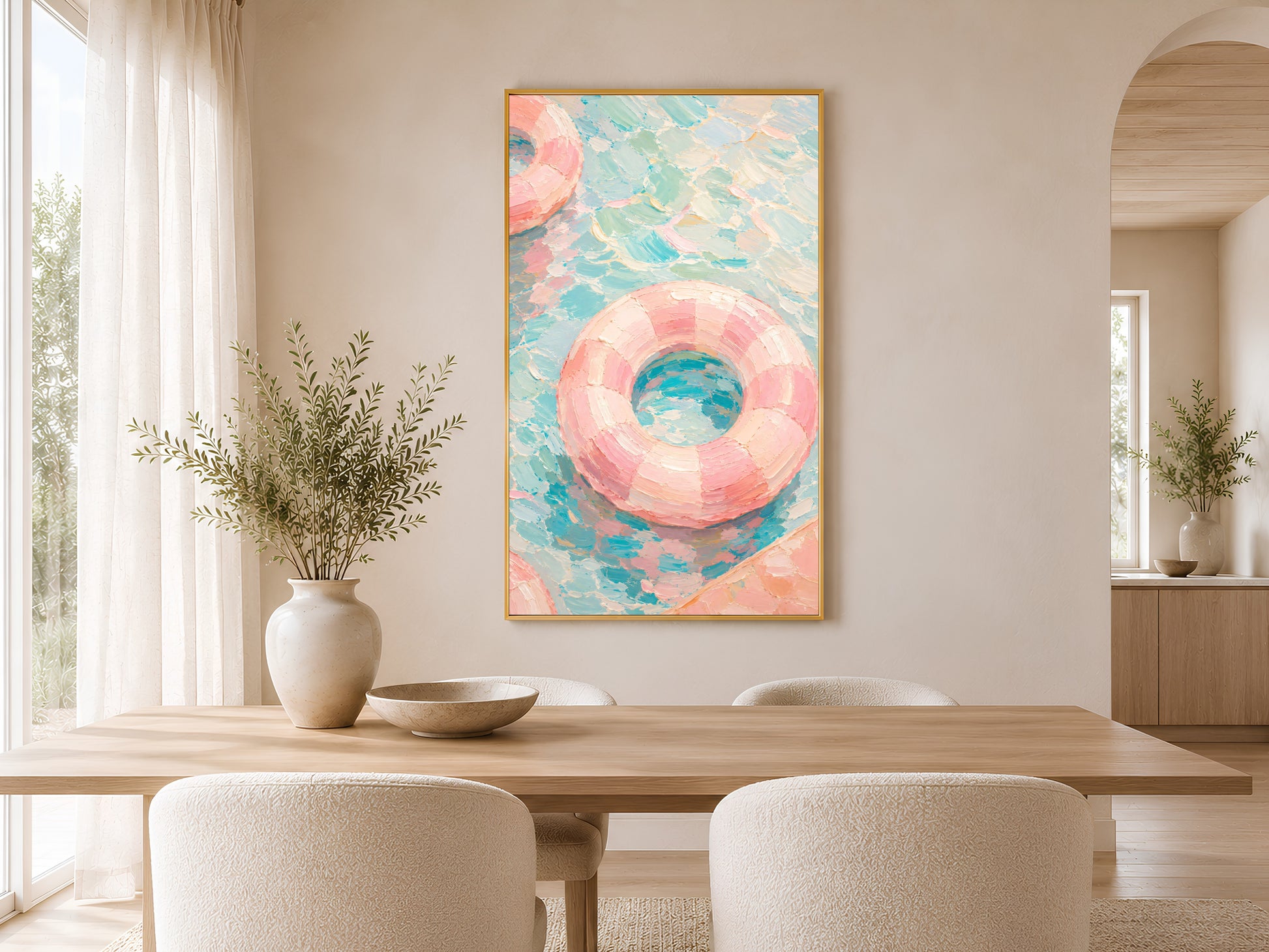Pink swimming pool wall art in gold frame styled in a bright neutral dining room with round table and linen chairs