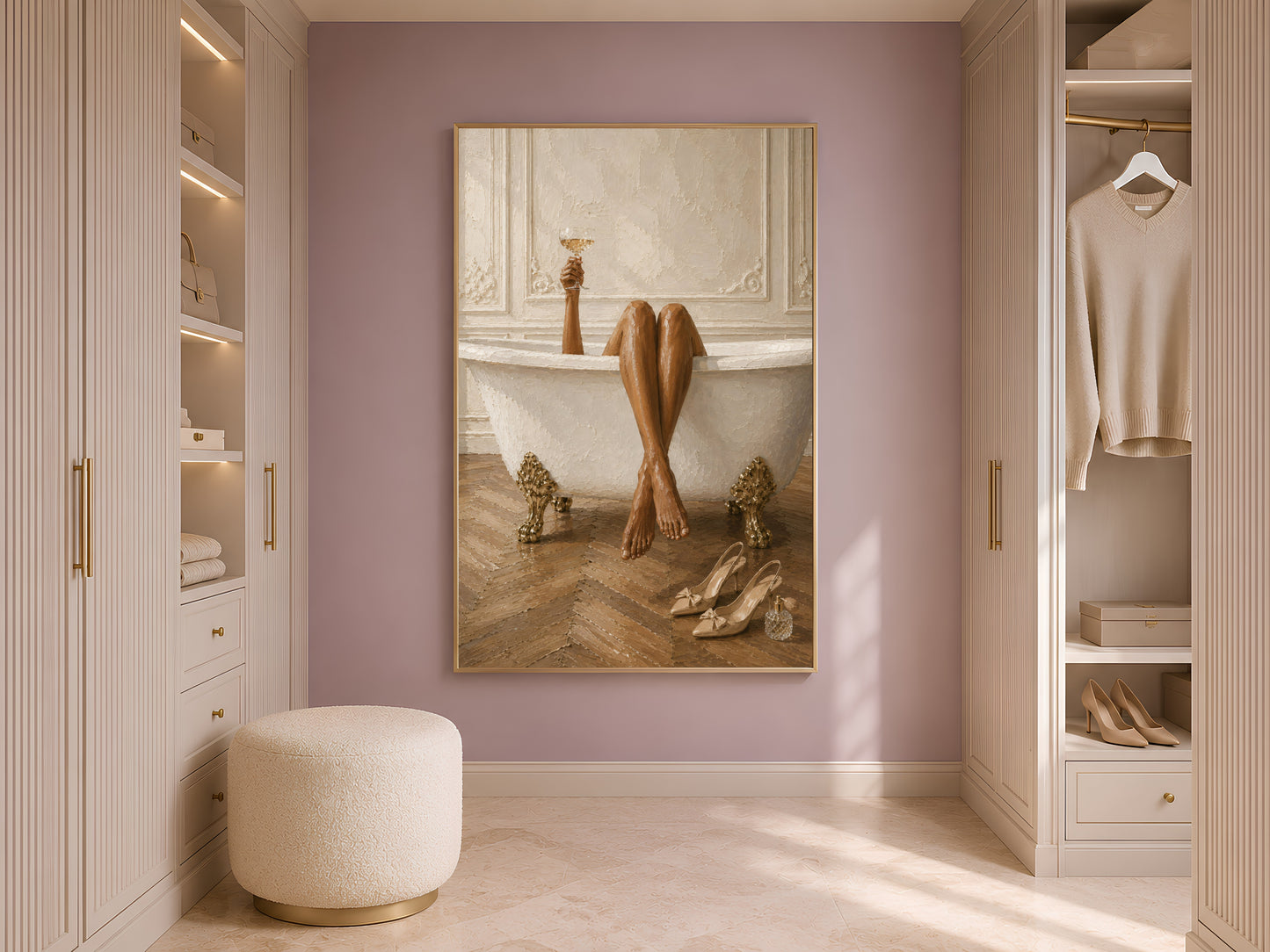 Framed clawfoot tub wall art displayed in a soft lilac walk-in closet with a round cream ottoman, hanging garments, and warm shelving
