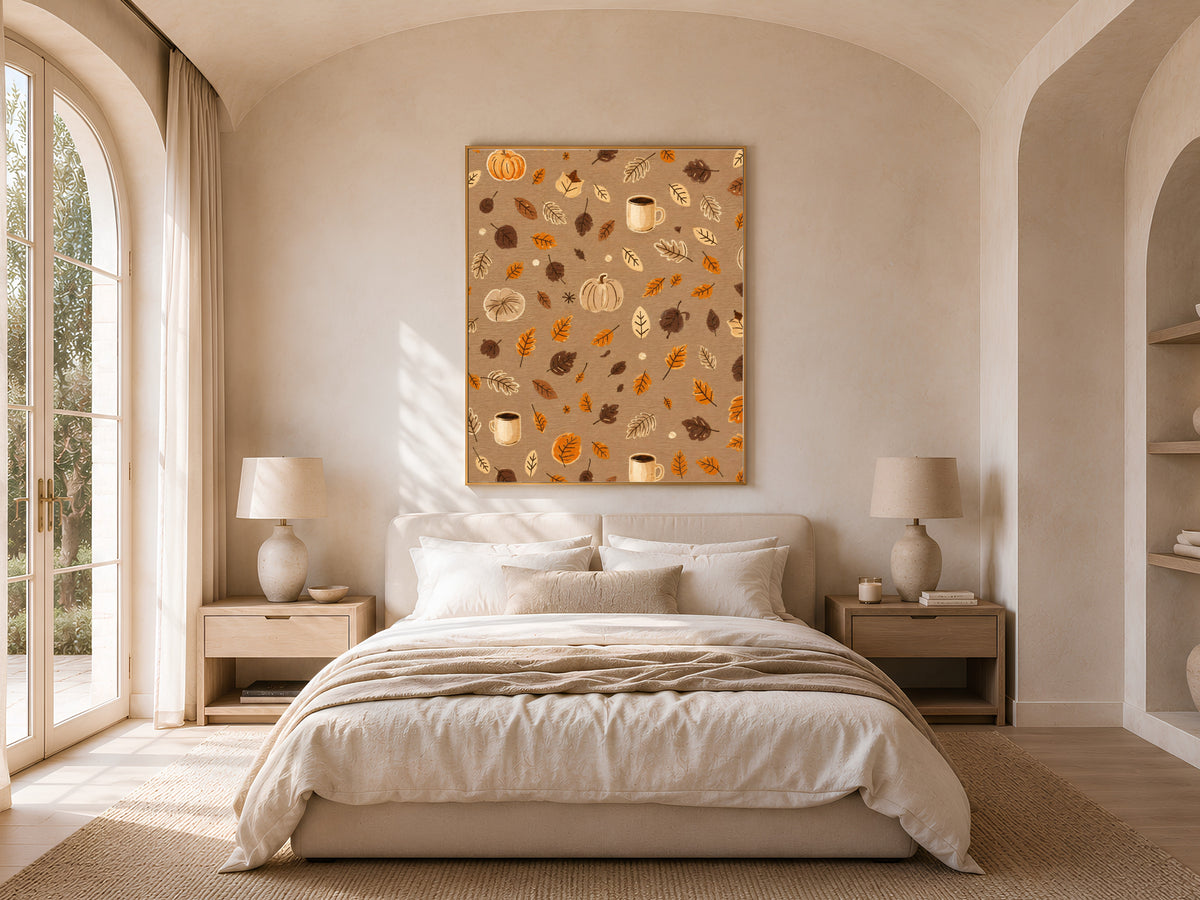 Cozy autumn pattern wall art with pumpkins and leaves above a neutral bedroom bed