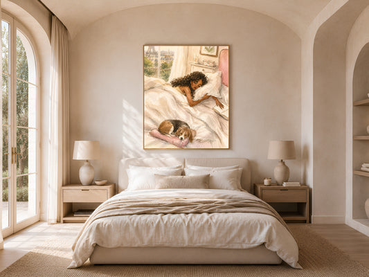 Framed Paris watercolor print above a neutral bedroom headboard with bedside lamps