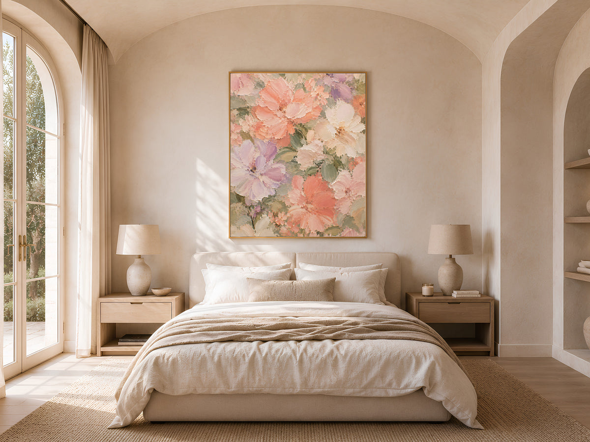 Pastel dahlia peony wall art print framed above a bed in a light-filled arched bedroom