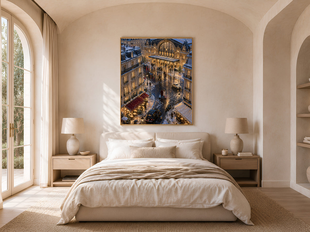 Vintage French cityscape print framed above bed in neutral bedroom