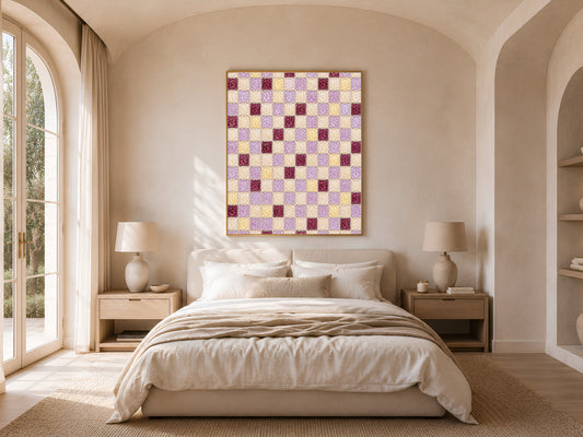 Purple mosaic tile wall art framed above a neutral bed in an arched-doorway bedroom