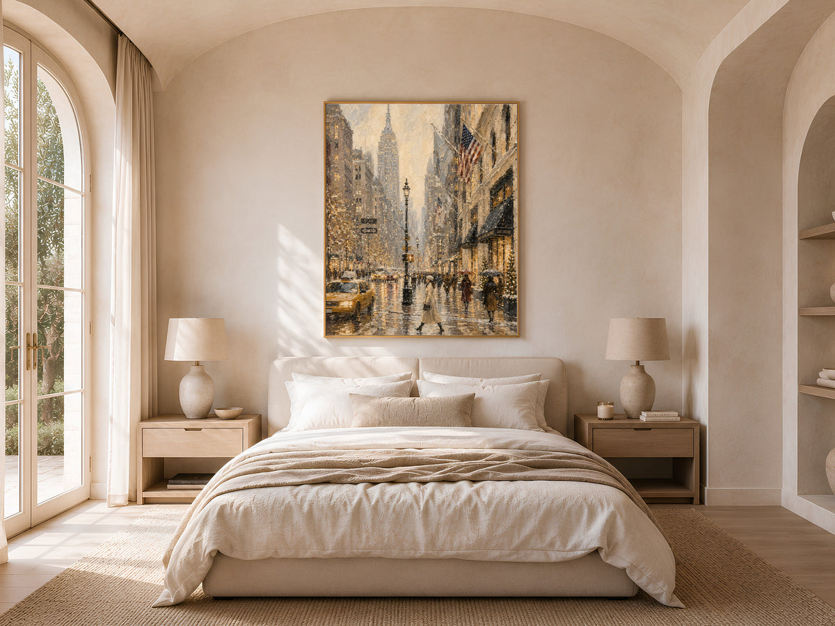 Empire State Building oil painting print framed above bed in warm neutral bedroom decor