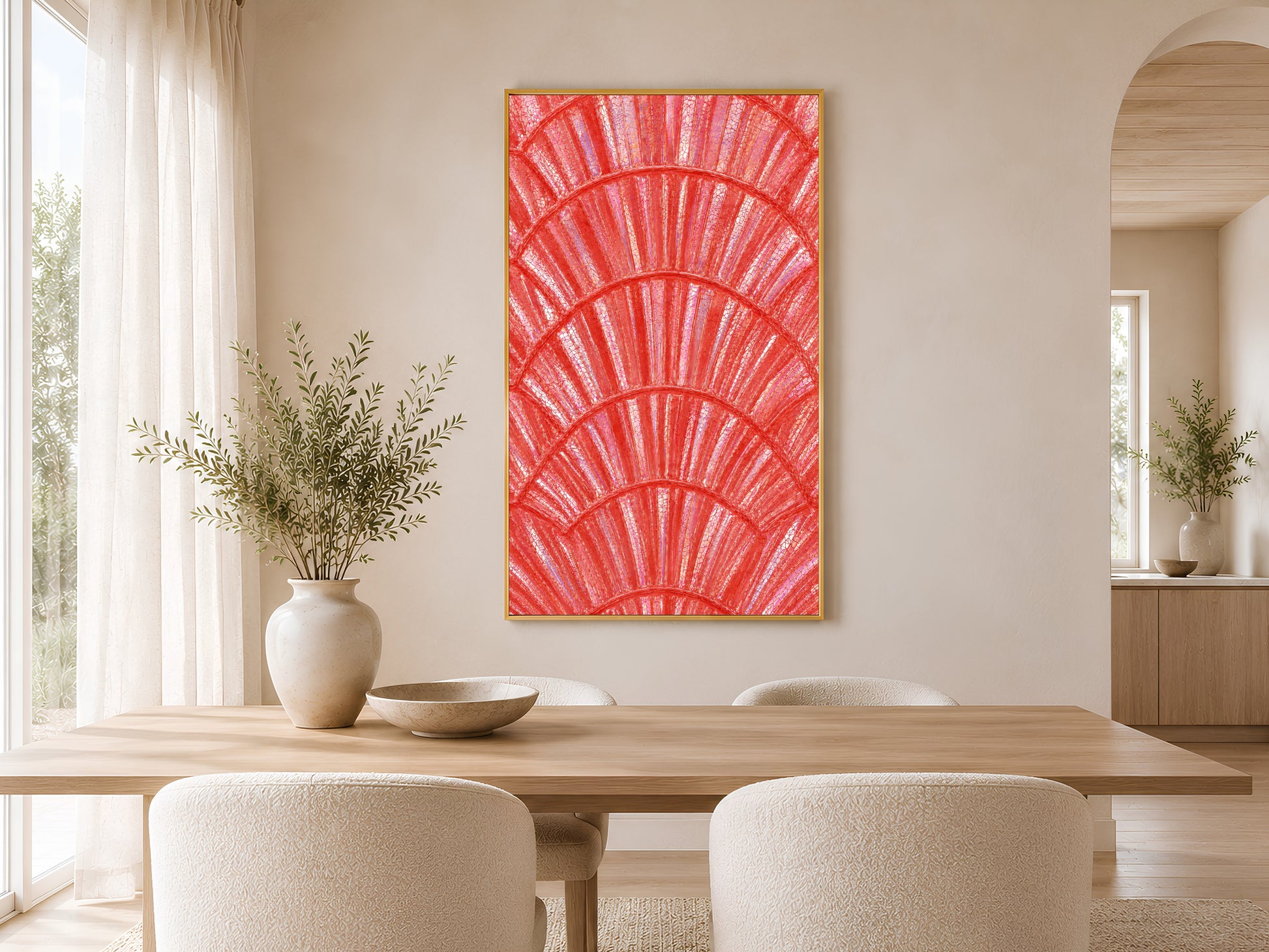Bold coral capiz shell wall art in gold frame styled in a bright neutral dining room with round table and linen chairs