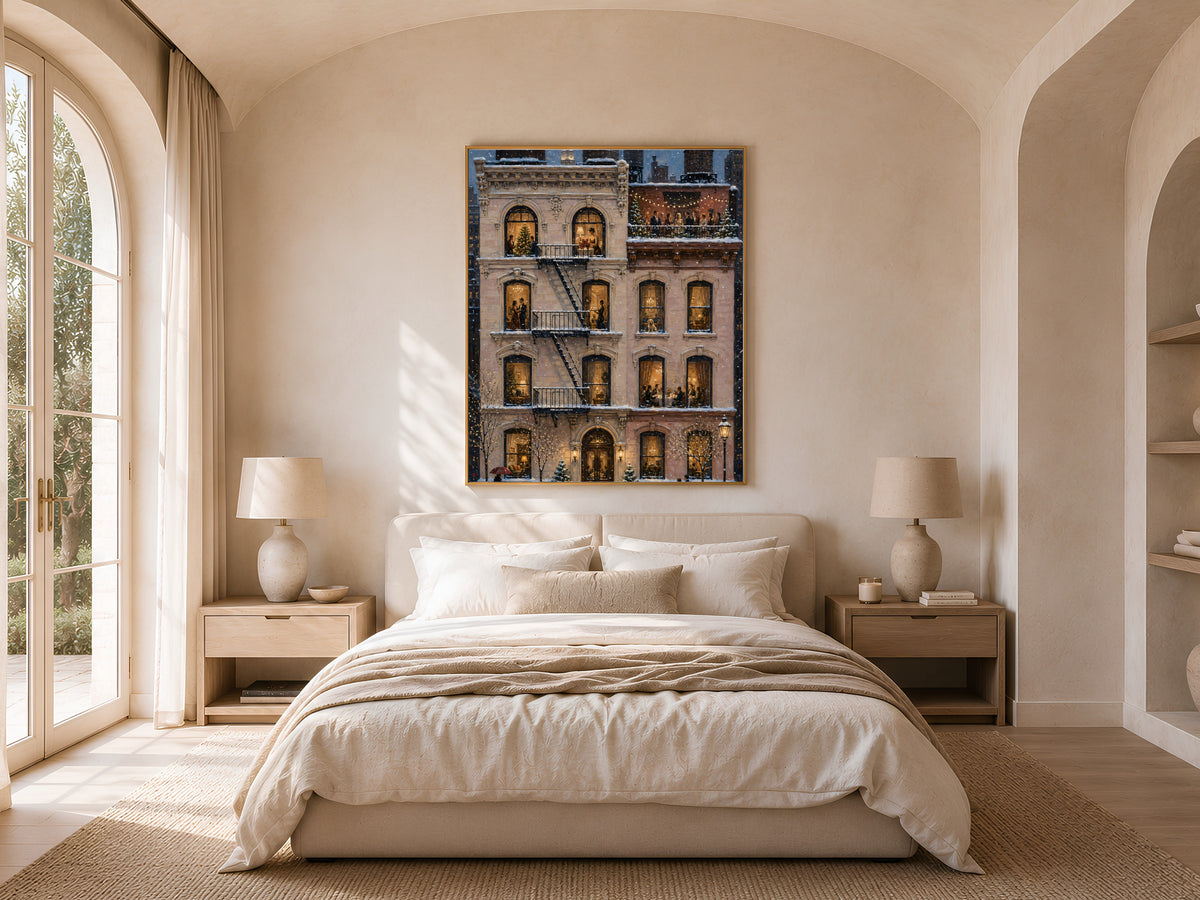 NYC Christmas painting framed above bed in sunlit bedroom with arched window