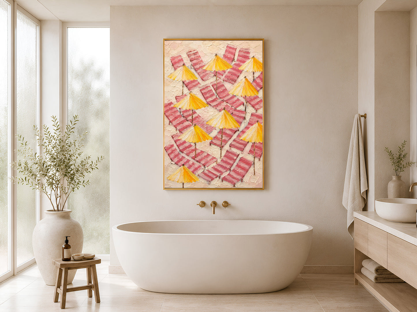 Pink and yellow beach umbrella wall art printable hanging above a freestanding bathtub in a calming spa-inspired neutral bathroom interior.