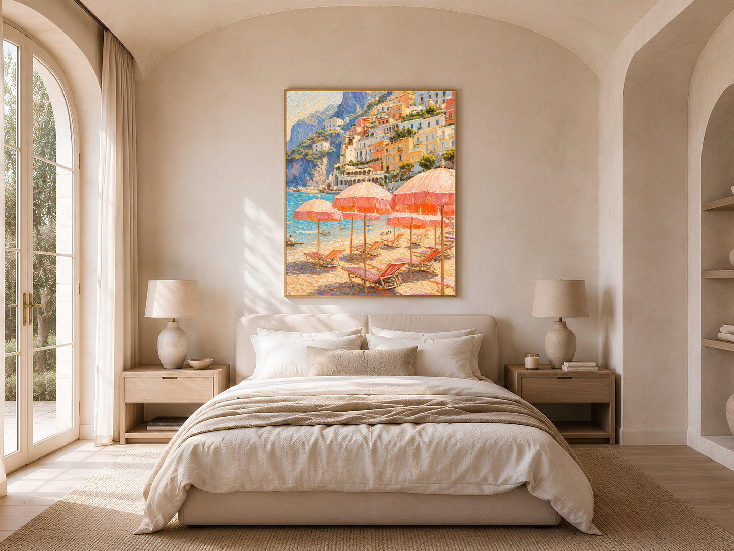 Bedroom interior with arched alcove, neutral linen bedding, and framed Italian Riviera impasto print of Positano and pink beach umbrellas above the bed.

