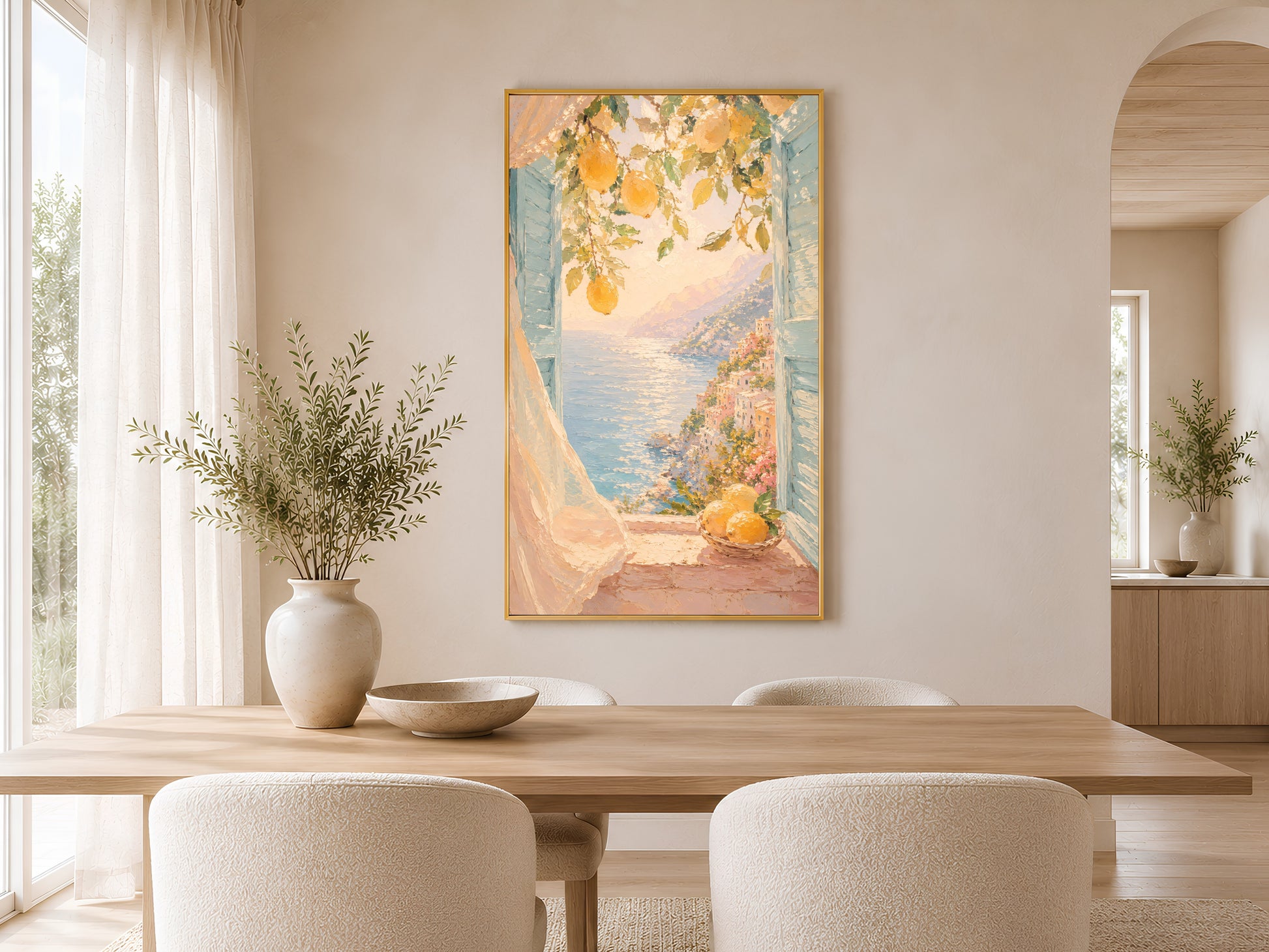 Italian lemon coastal print in gold frame styled in a bright neutral dining room with round table and linen chairs