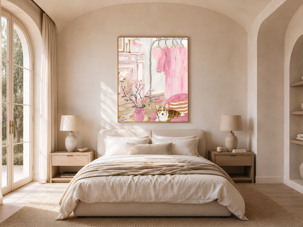 Coquette bedroom painting framed in gold above a neutral bedroom bed, pink closet illustration with arched window light
