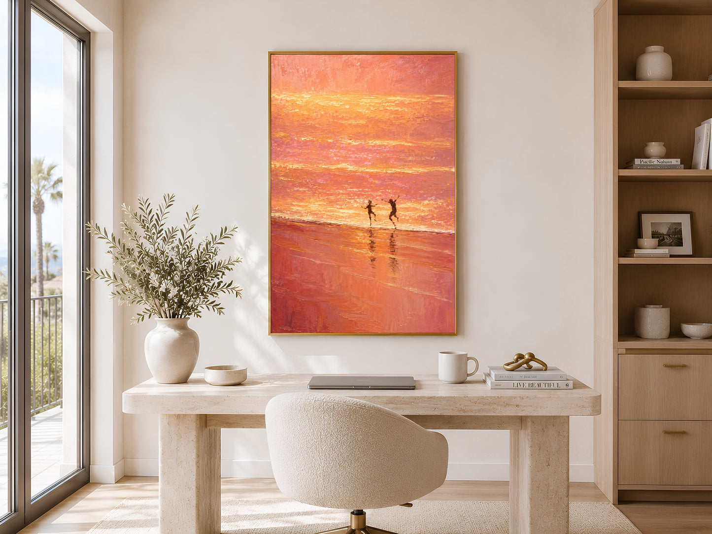 Romantic sunset ocean wall art printable styled above a minimalist desk in a bright coastal-inspired home office with warm organic decor.