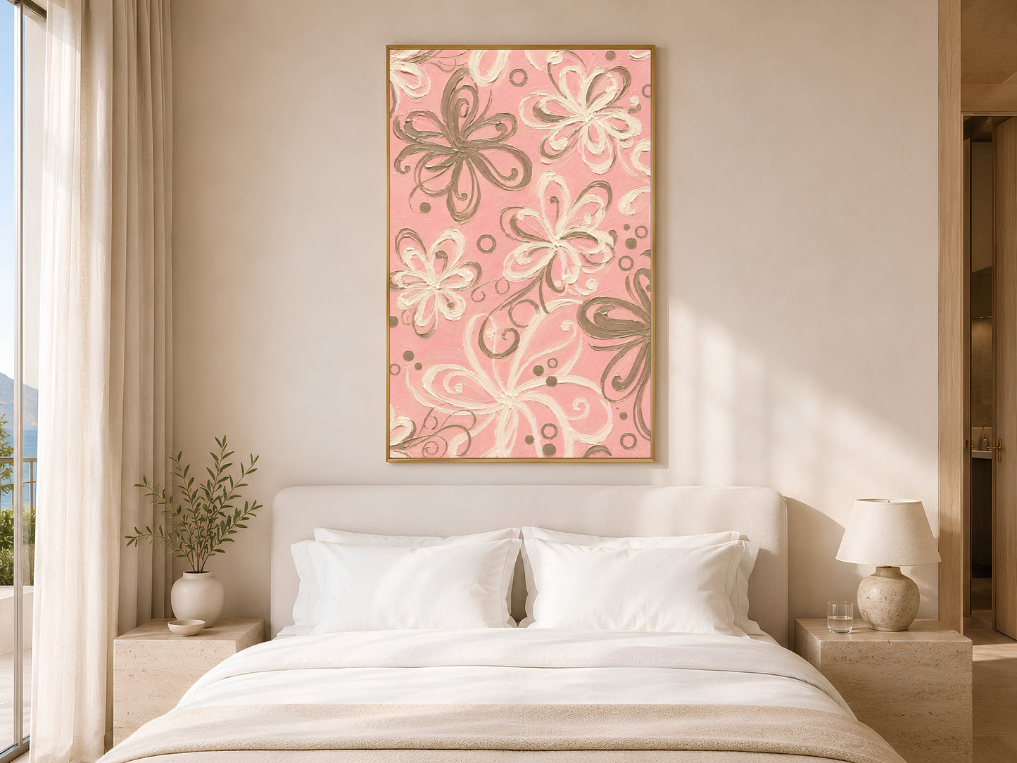 Pink retro swirl floral print in gold frame above white bed in warm neutral bedroom with soft lighting
