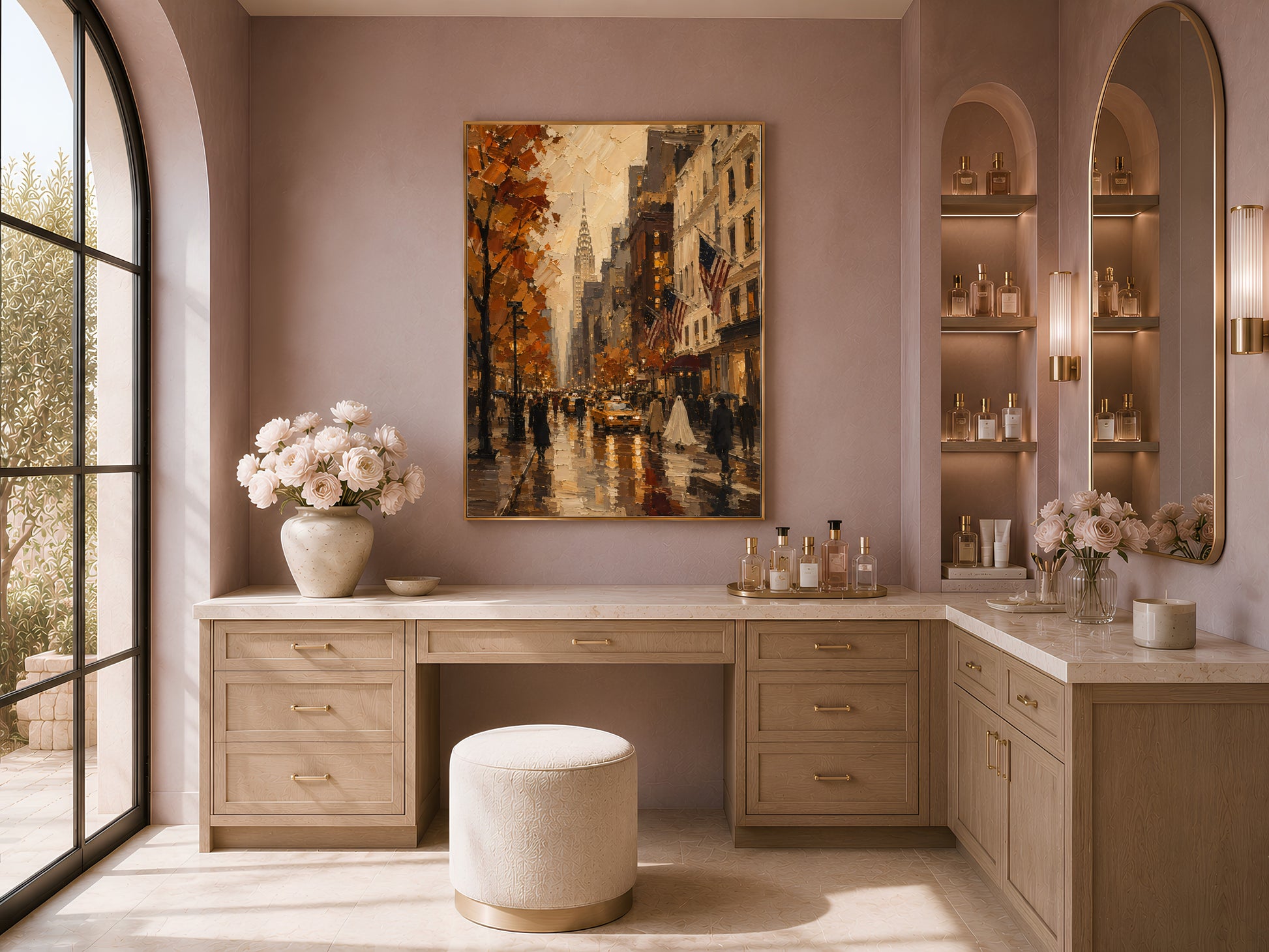 Arched vanity nook with the New York City print above a wood console, stool, and fresh flowers