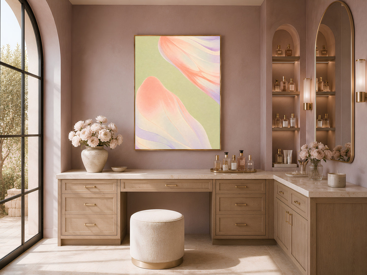 Sage green and coral abstract wall art displayed above a desk in a bright dressing nook