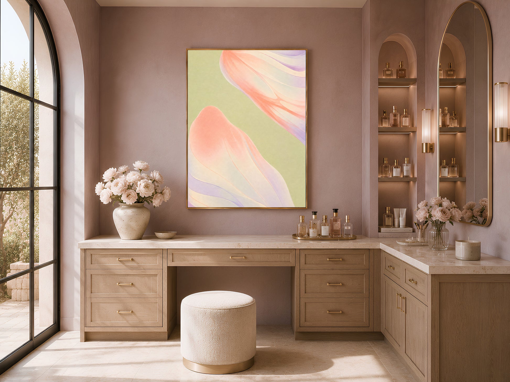 Sage green and coral abstract wall art displayed above a desk in a bright dressing nook