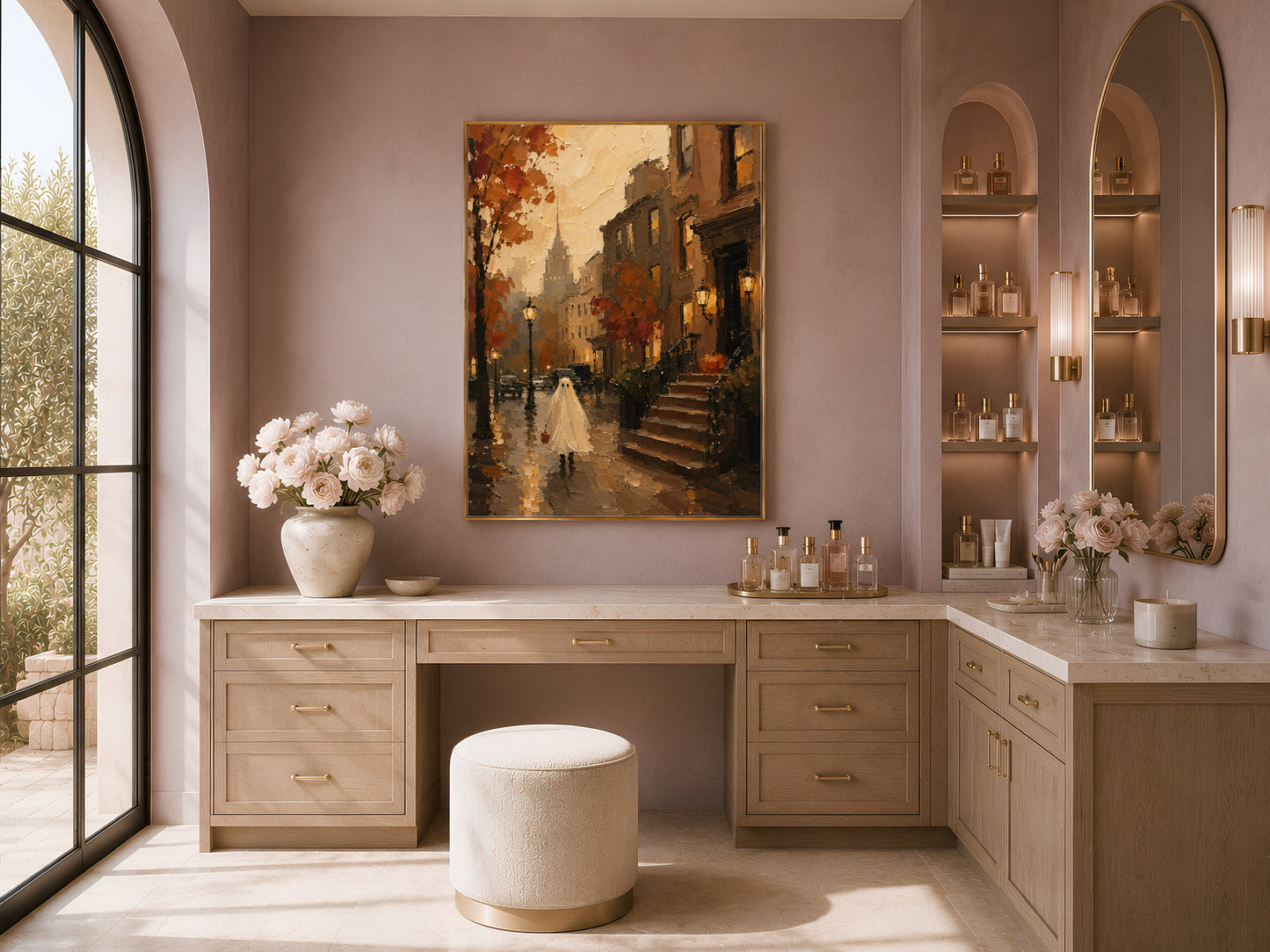Built-in shelving nook with the brownstone Halloween print centered above a low cabinet, flanked by books and ceramics