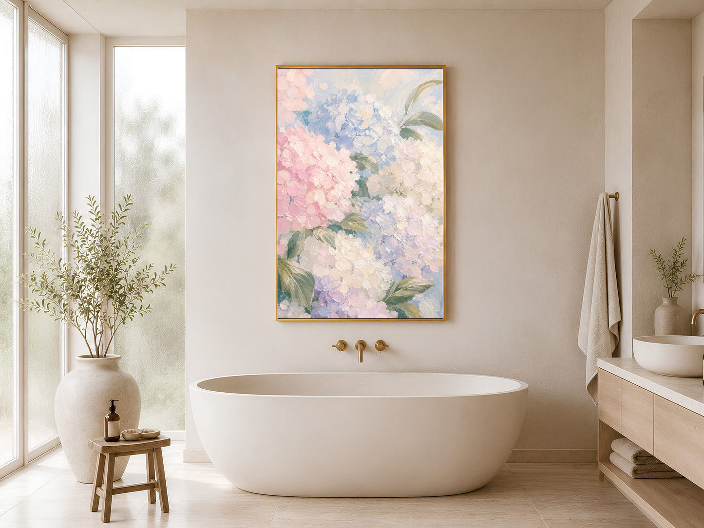 Hydrangea oil painting print in gold frame hung in a minimal white bathroom with freestanding bathtub and wood stool