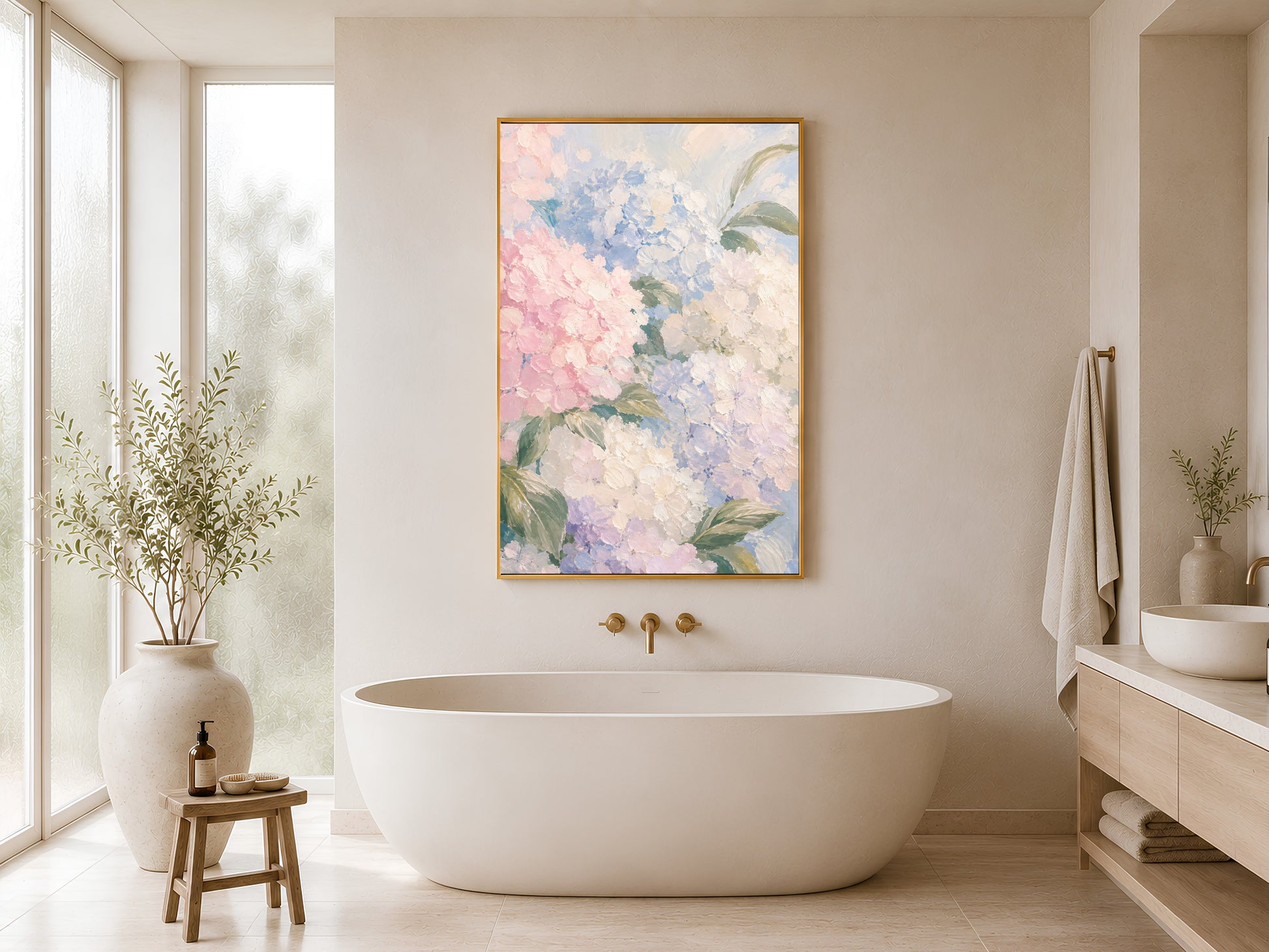 Hydrangea oil painting print in gold frame hung in a minimal white bathroom with freestanding bathtub and wood stool