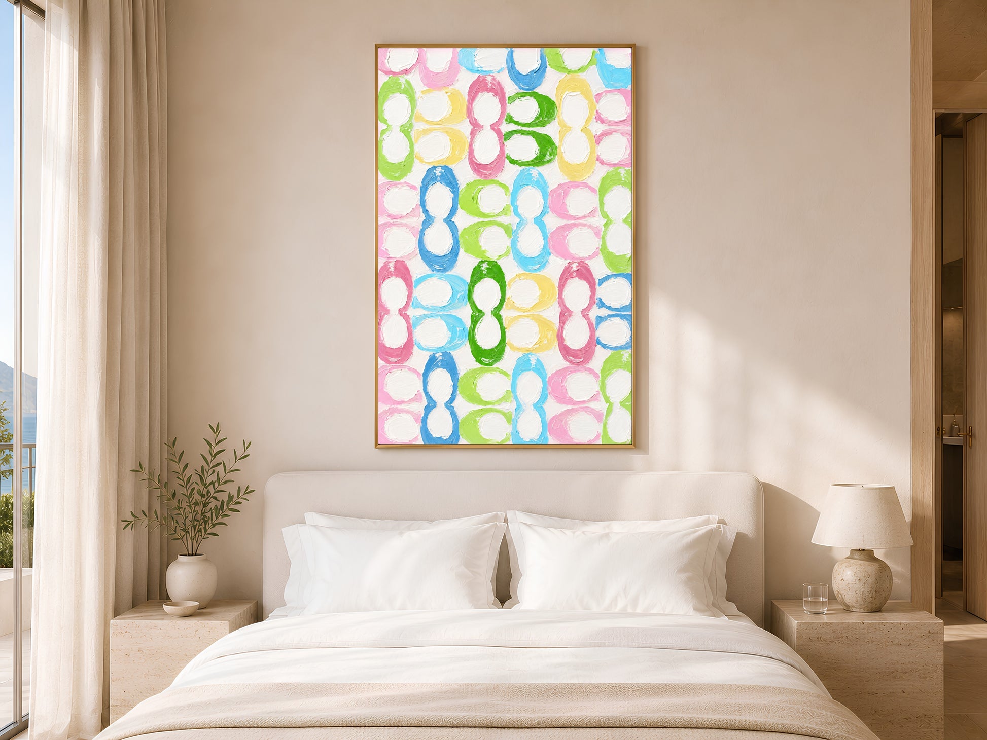 Colorful retro loop pattern print in gold frame above white bed in calm neutral bedroom with soft natural light

