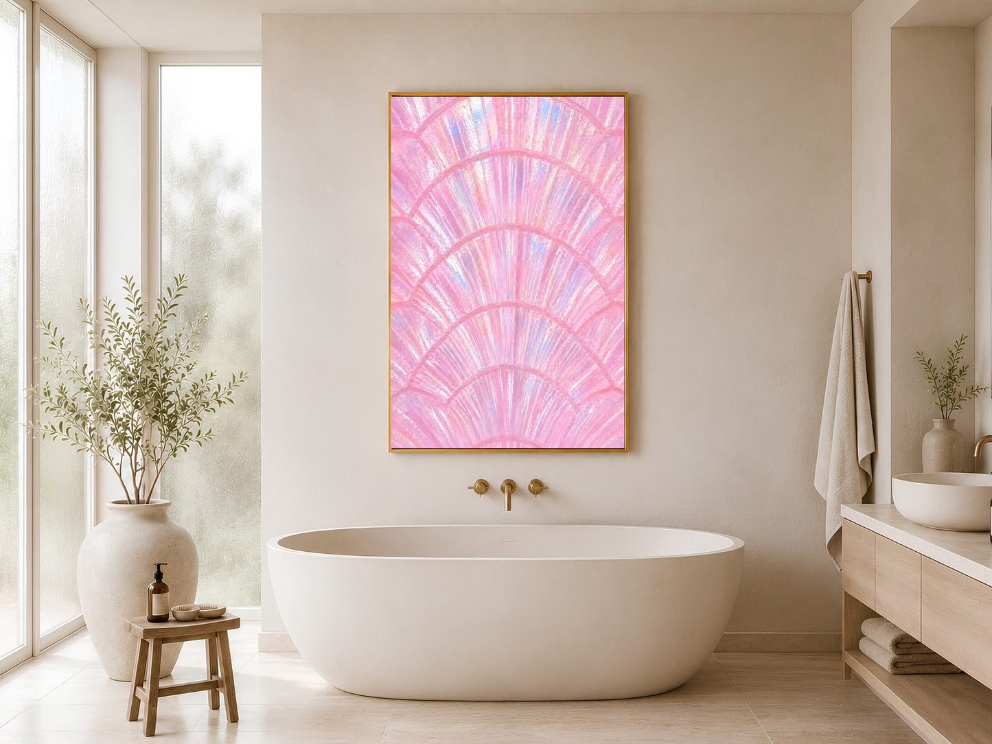 Pink capiz shell wall art in gold frame hung in a minimal white bathroom with freestanding bathtub and wood stool
