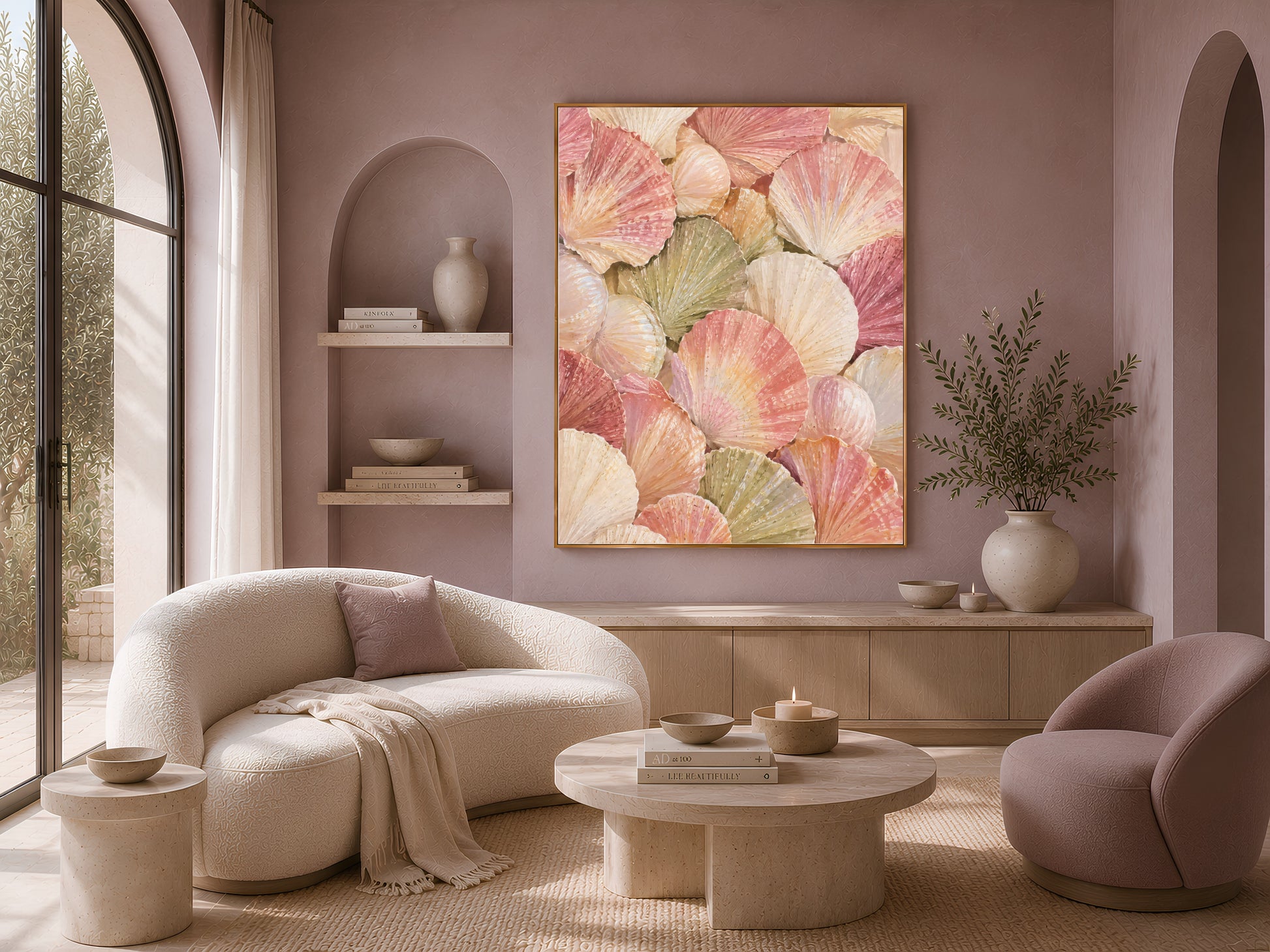 Scallop shell wall art framed above a curved boucle sofa in a coastal living room, sage and blush seashell painting
