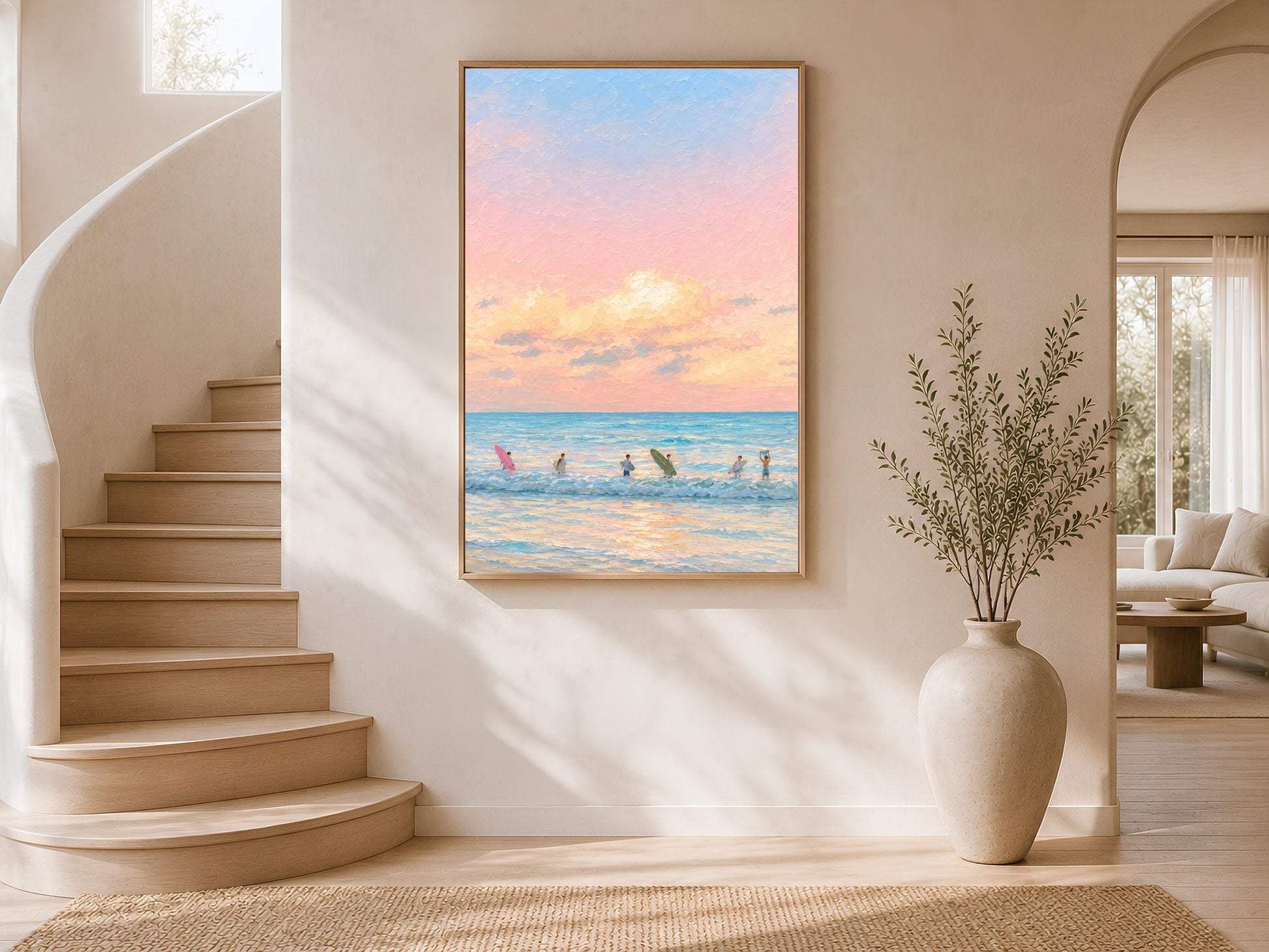Framed impasto pastel sunset surf print on warm white wall in modern curved staircase entryway with tall ceramic vase
