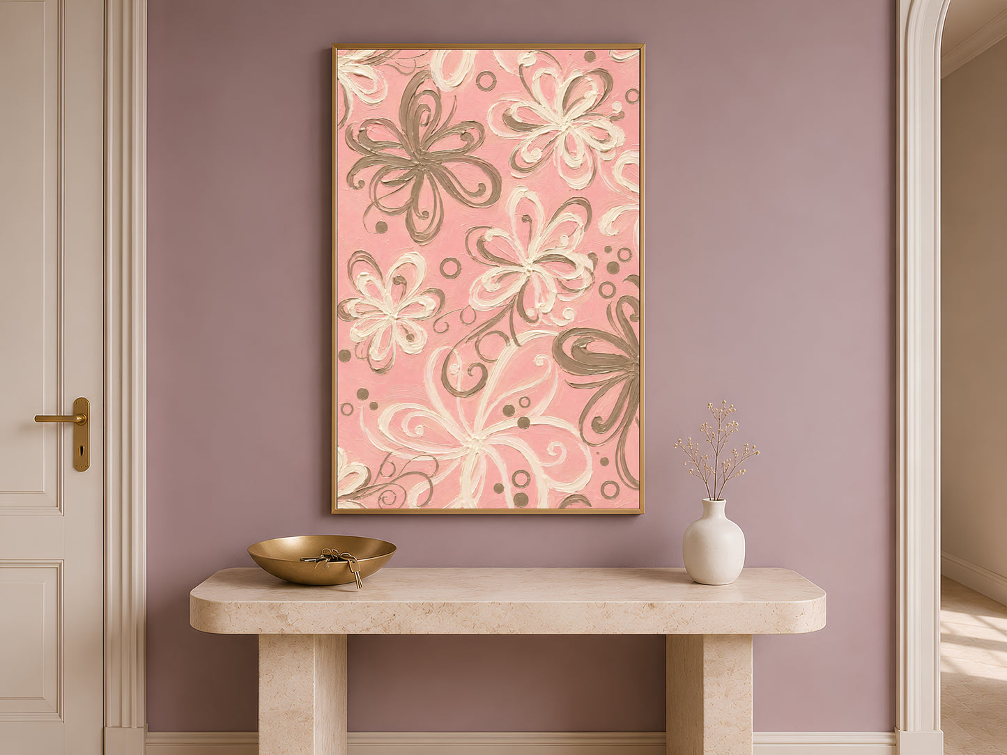 Pink retro swirl floral print in gold frame on travertine console table in hallway with mauve accent wall
