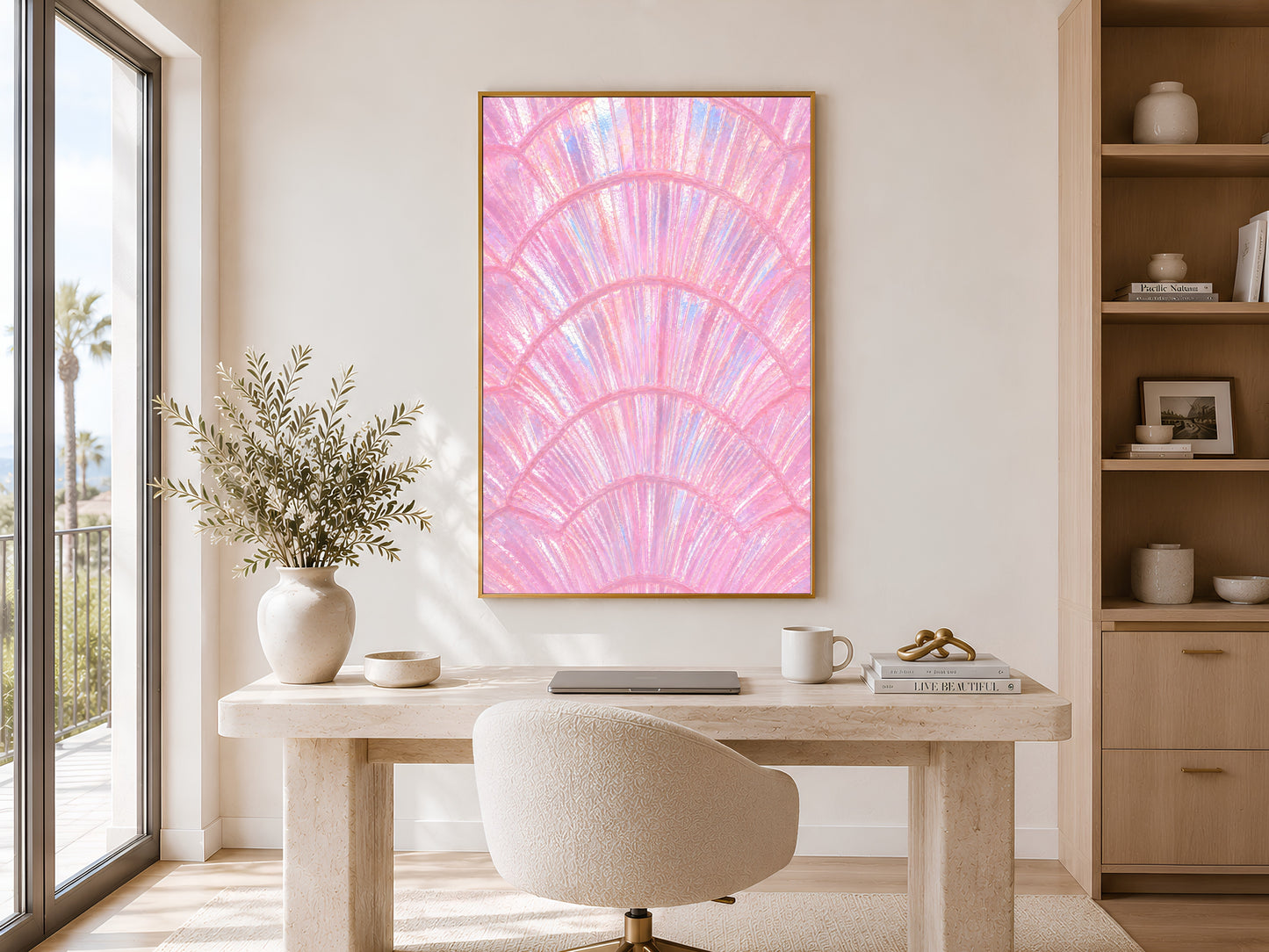 Iridescent capiz shell print in gold frame above a marble console table in a minimal bright neutral hallway