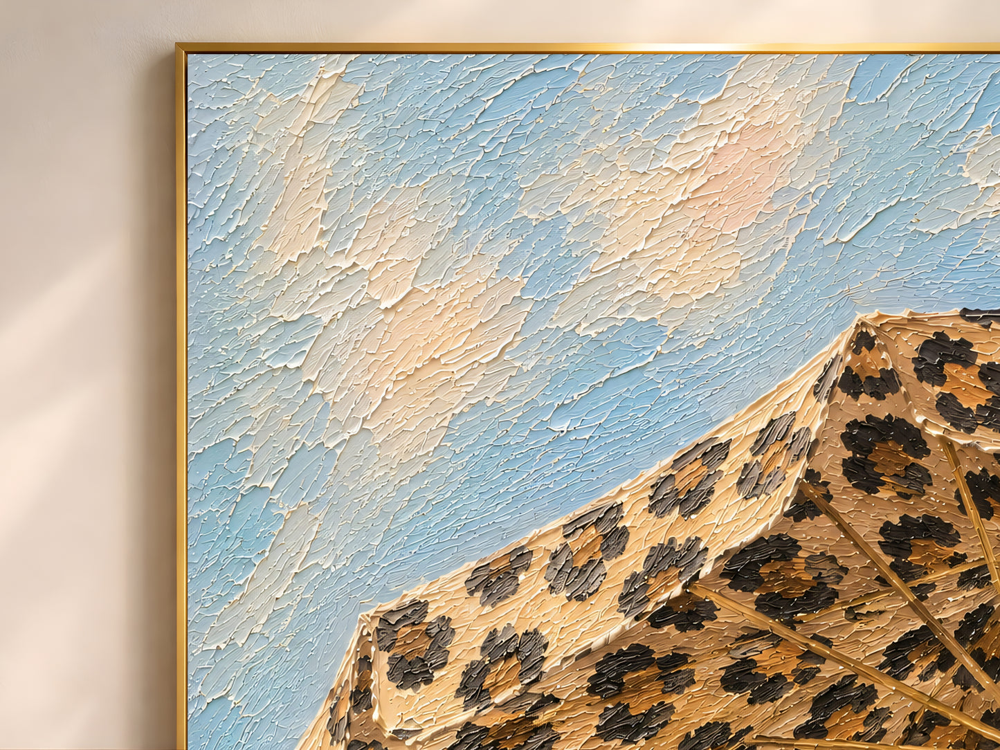 Close-up of leopard print beach umbrella impasto painting print showing thick palette knife texture in caramel, toffee brown, black and sky blue
