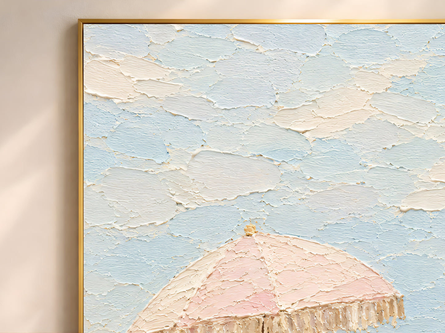 Close-up of pastel beach scene impasto print showing pink fringed umbrella and woman in hat with thick textured paint strokes in blush and cream

