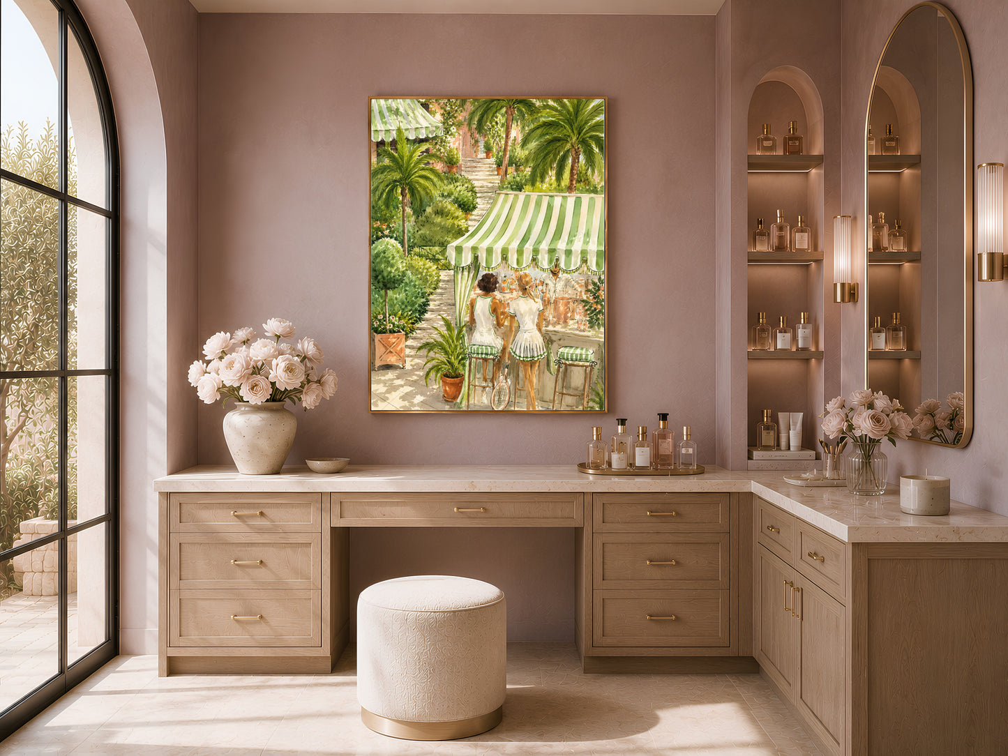 Framed tennis club watercolor print above a wood vanity nook with flowers and a mauve accent wall.
