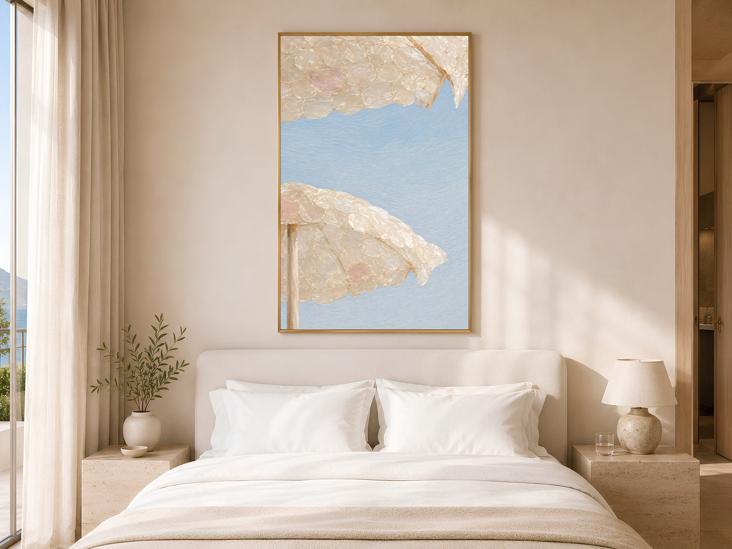 Capiz shell beach umbrella print framed above a white bed in a neutral bedroom
