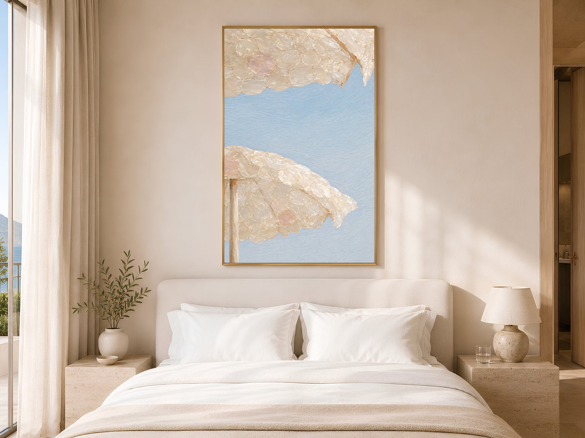 Capiz shell beach umbrella print framed above a white bed in a neutral bedroom
