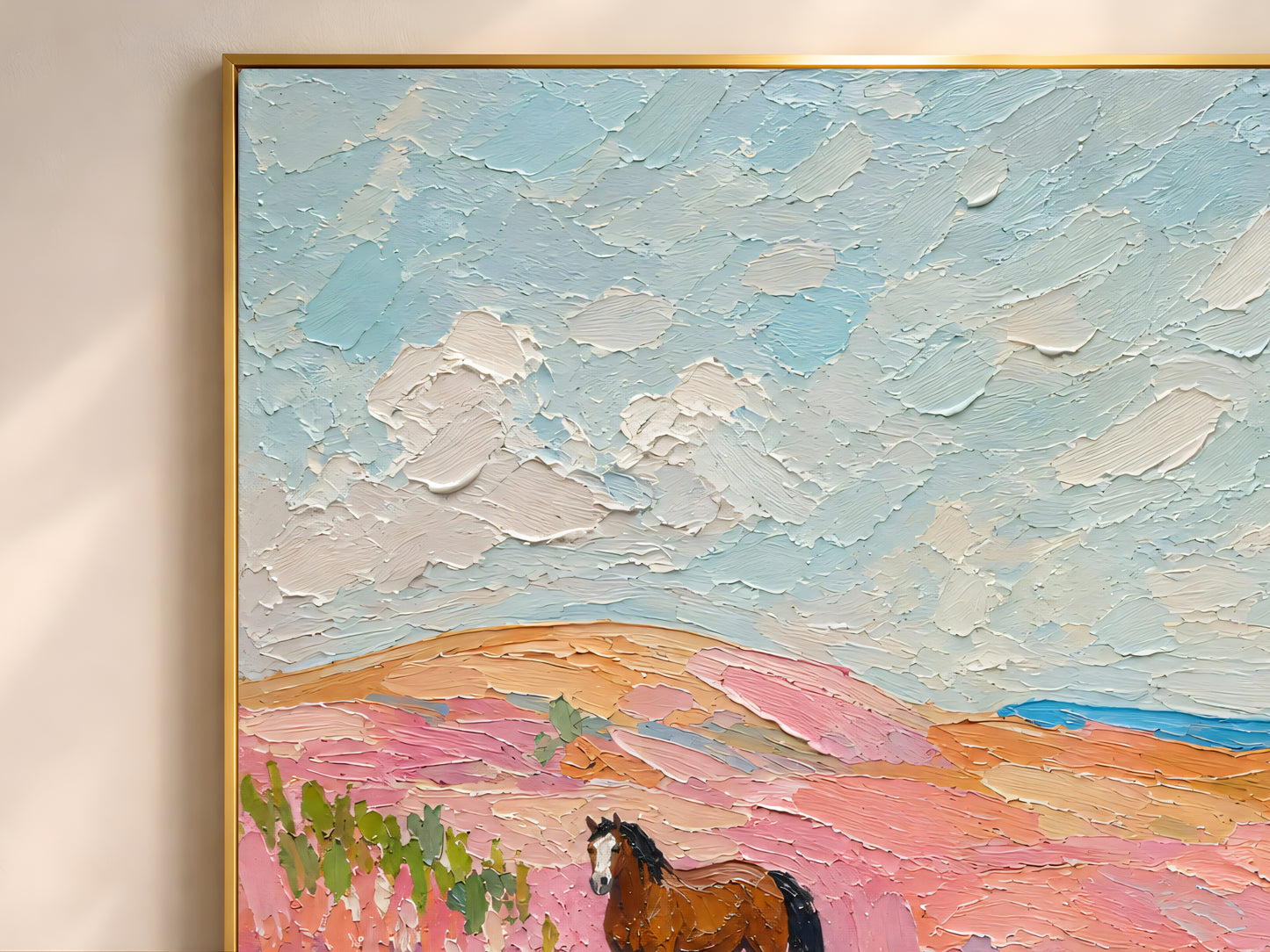Close-up detail of impasto oil painting texture showing two bay horses in a sweeping pink and coral wildflower landscape under a pale blue cloudy sky
