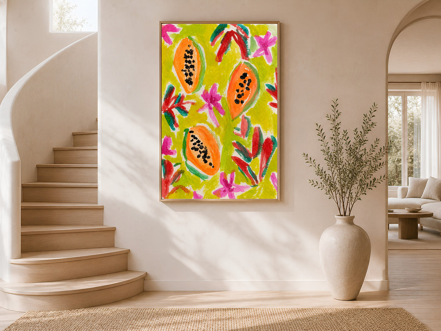 Colorful papaya print in a gold frame on a curved staircase wall with warm white plaster finish and arched window with natural light

