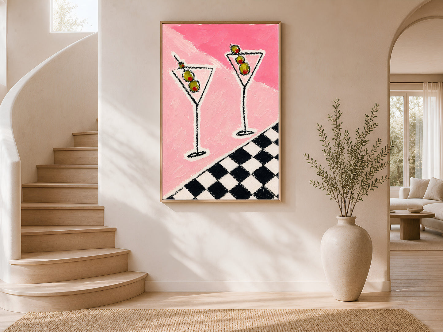 Framed impasto martini print on warm white wall in modern curved staircase entryway with tall ceramic vase
