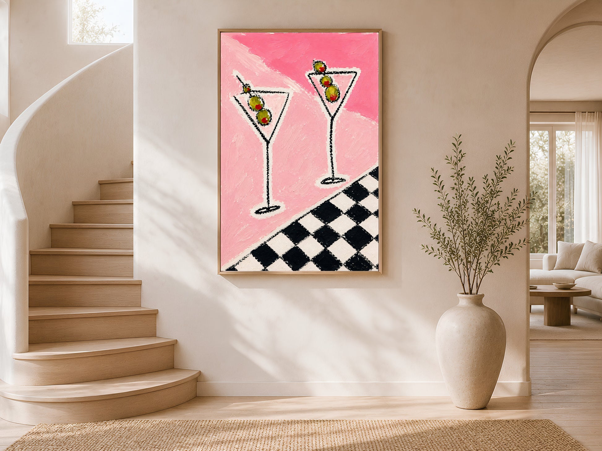 Framed impasto martini print on warm white wall in modern curved staircase entryway with tall ceramic vase
