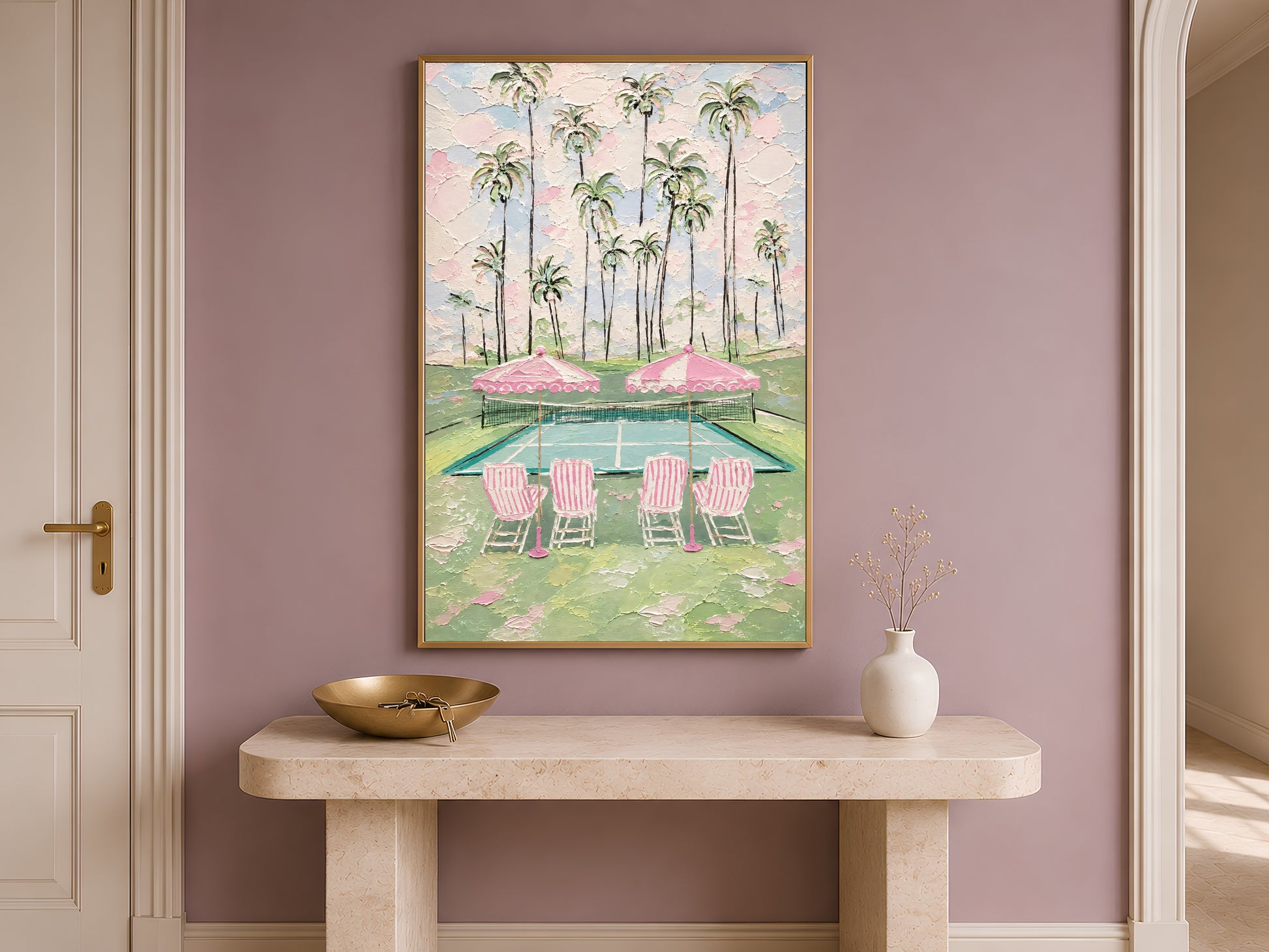Pink tennis court wall art in gold frame on console table in hallway with mauve accent wall
