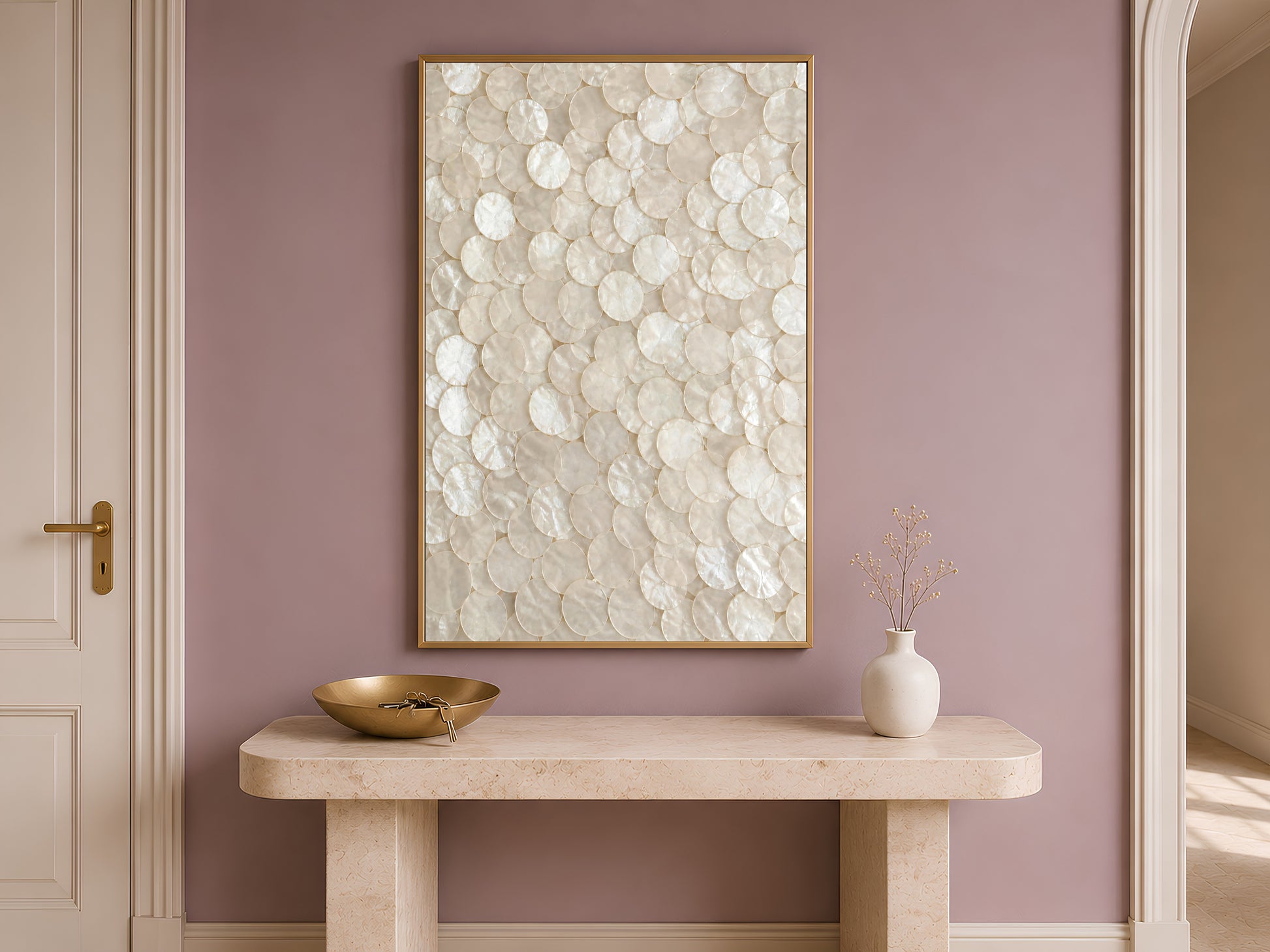 Capiz shell mosaic print framed on an entryway wall above a console table
