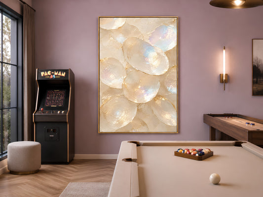 Oyster shell print framed in gold hanging in moody purple room with pool table in background
