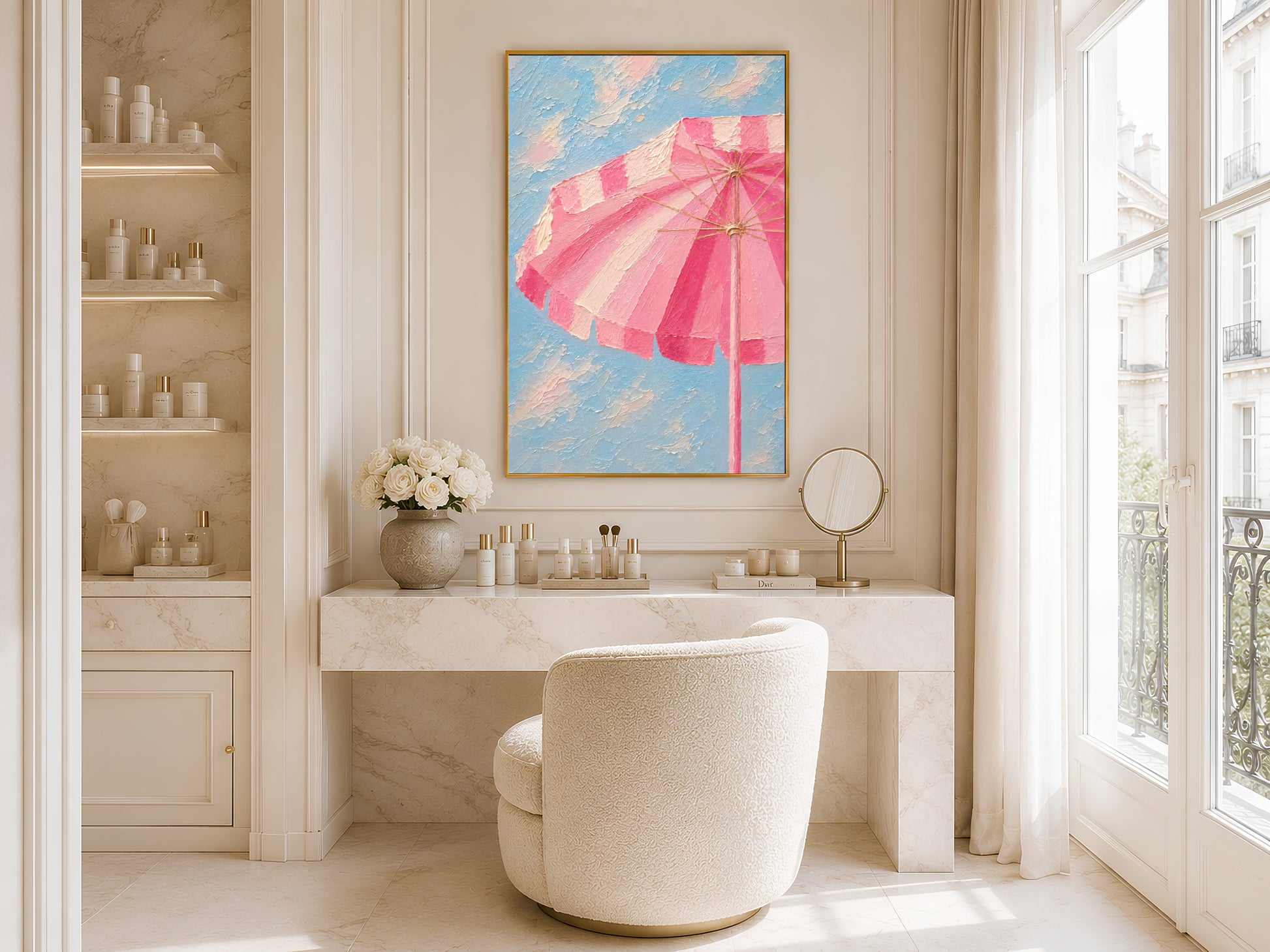 Framed pink beach umbrella impasto art print on a warm white wall in a bright minimal bathroom beside a round freestanding bathtub and large window
